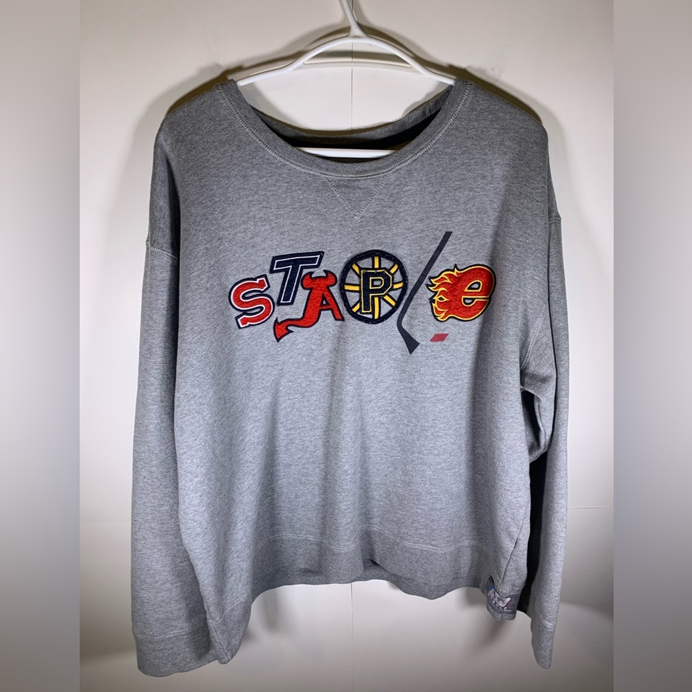 Y2K staple brand hockey logo